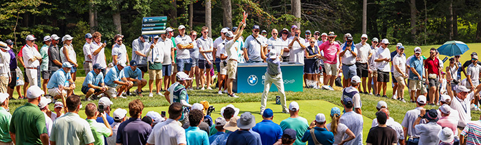 A player hits a tee shot at BMW Championship.